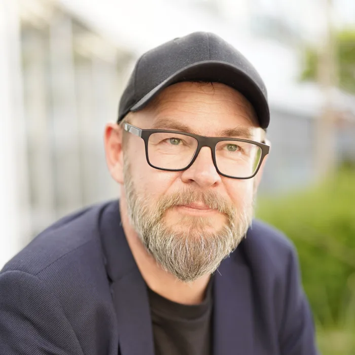 Portrait of Andreas Feischen, management.